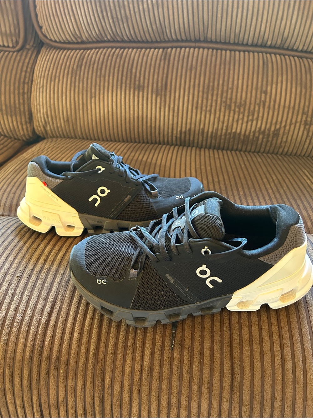 On Running Black and White Cloud Athletic Shoes